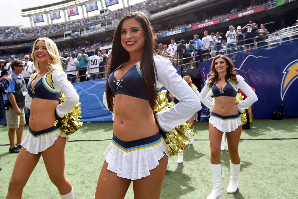 San Diego Chargers cheerleaders perform before the Cleveland Browns face th...