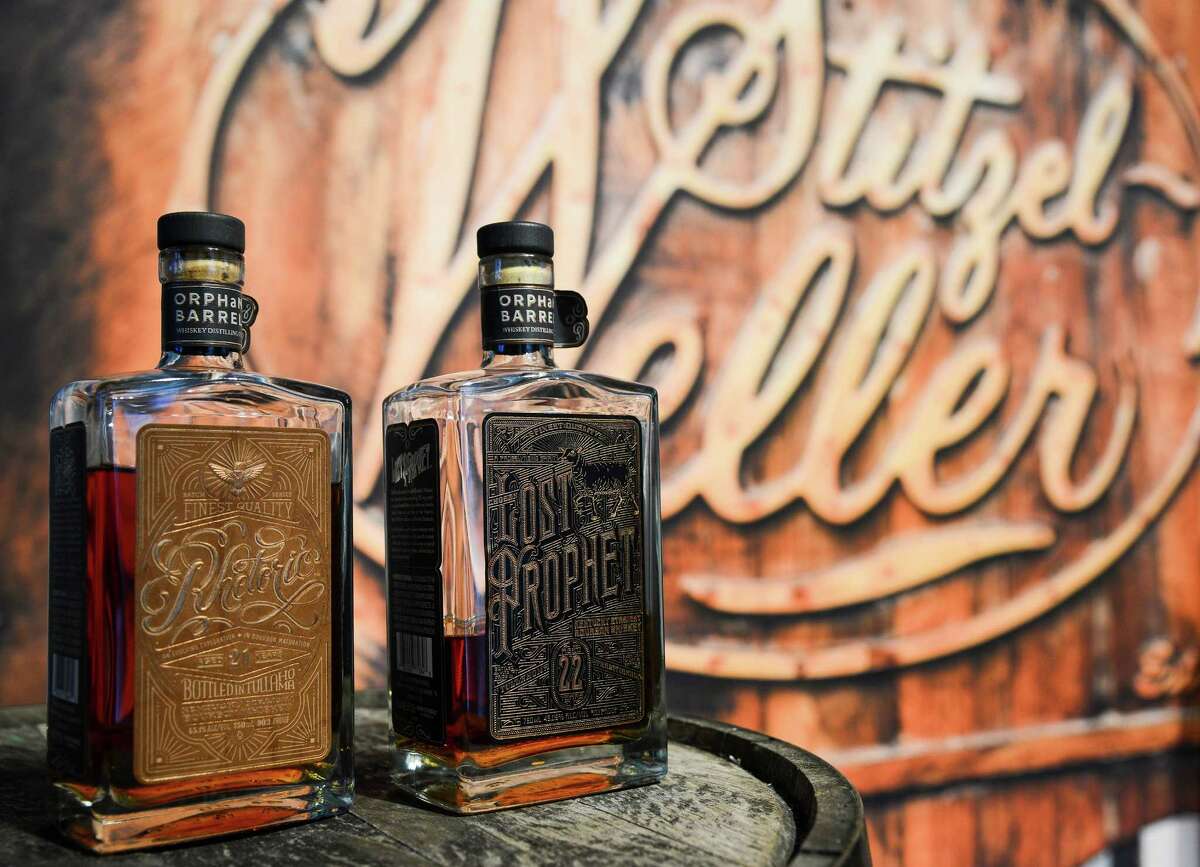 In this photo provided by Neiman Marcus, two bottles of bourbon available for tasting represent the $125,000 Orphaned Barrel Project gift during the launch of the Neiman Marcus Christmas Book, Tuesday, Oct. 6, 2015 in Dallas. (Tim Sharp/Neiman Marcus via AP)