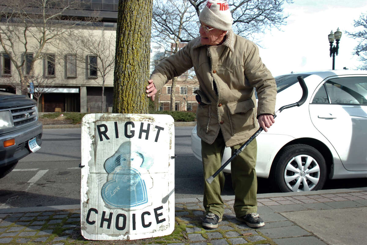 Stanley Scott, of Fairfield, heading a demonstration against the legalization of abortion outside the federal courthouse in Bridgeport in 2010.