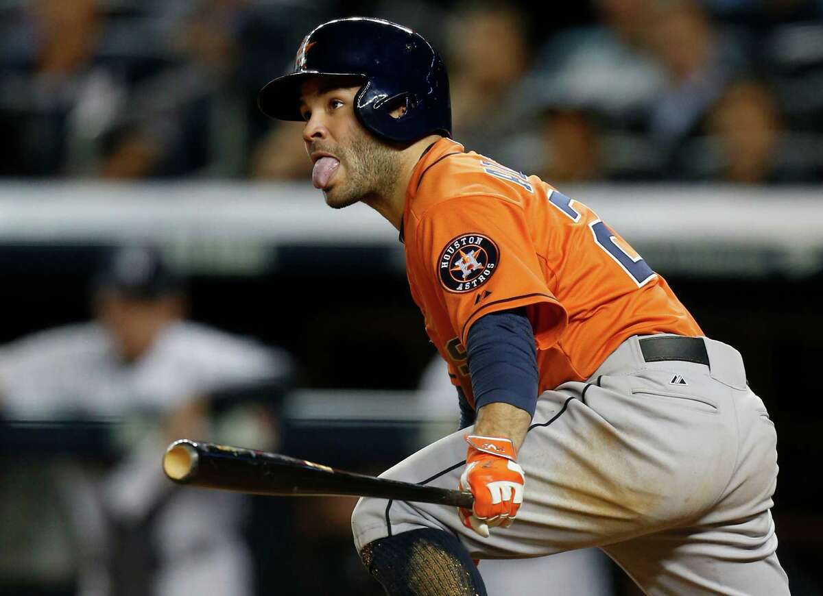 Jose Altuve strokes a single to left field in the seventh inning to bring home the third run of Tuesday night's game for the Astros, more than enough with four pitchers teaming up on a three-hit shutout of the Yankees.
