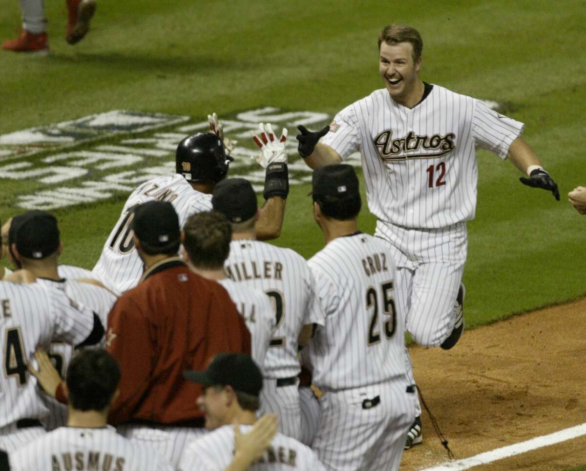 Jeff Kent (12) heads home after his dramatic three-run homer to win Game 5 of the 2004 National League Championship Series against the Cardinals. The win put the Astros one victory shy of the World Series, but they dropped the final two games in St. Louis. 