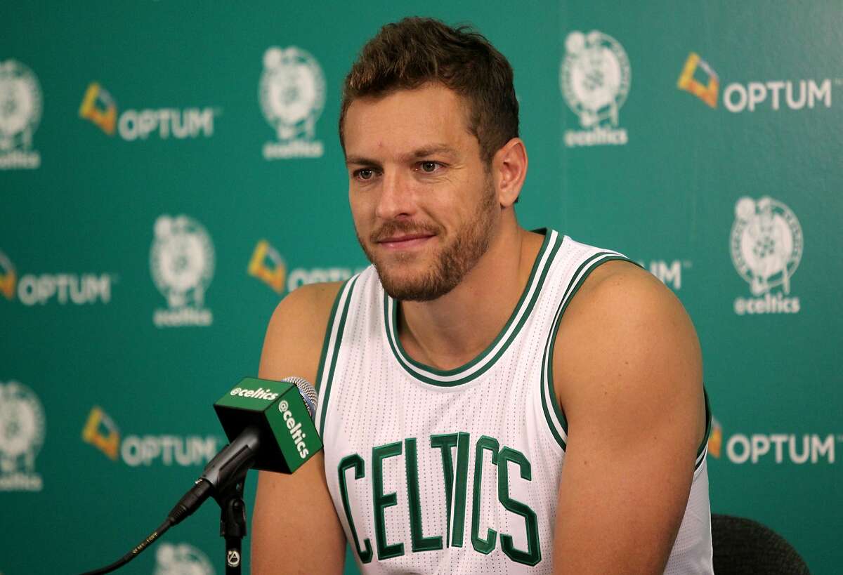 Boston Celtics player David Lee listens to a question during the Boston Celtics media day at their training facility in Waltham, Mass., Friday, Sept. 25, 2015. (AP Photo/Mary Schwalm)