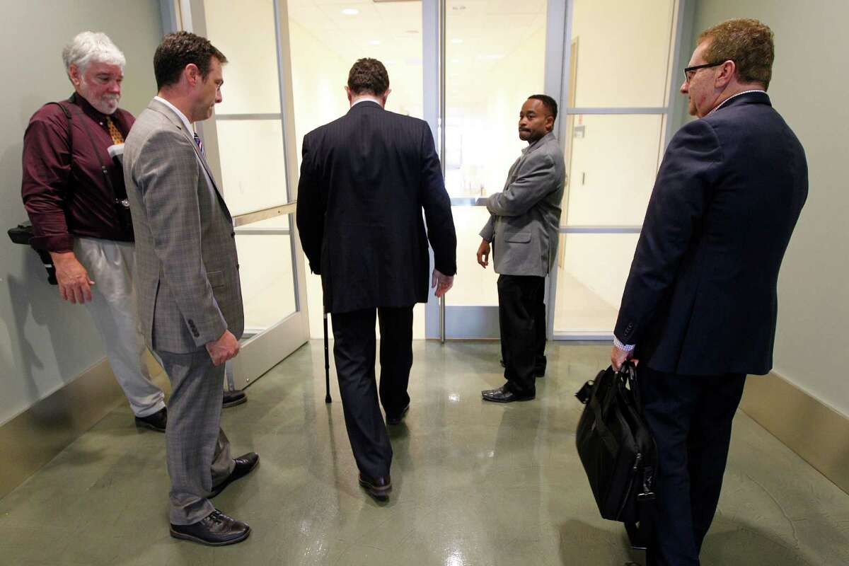 HISD Superintendent Terry Grier departs after holding a surprise news conference Sept. 10, 2015, to announce his resignation. ( Steve Gonzales / Houston Chronicle )
