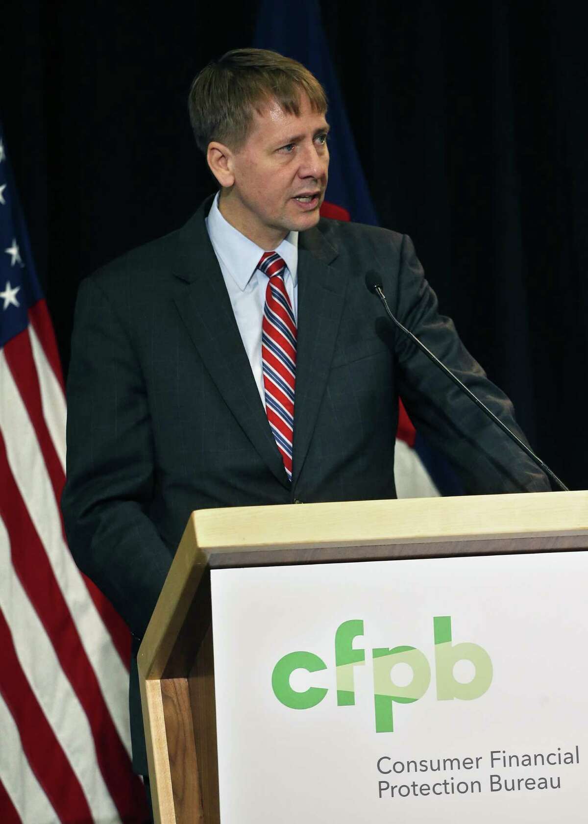 Consumer Financial Protection Bureau Director Richard Cordray speaks during a a hearing in Denver where he discussed his agency's proposal on arbitration, in Denver, Colo., Wednesday, Oct. 7, 2015. If enacted, the plan would severely curtail a contentious practice called mandatory arbitration, which consumer advocates have long argued does a disservice to people who have disputes with banks, credit card issuers and other financial service providers. (AP Photo/Brennan Linsley)