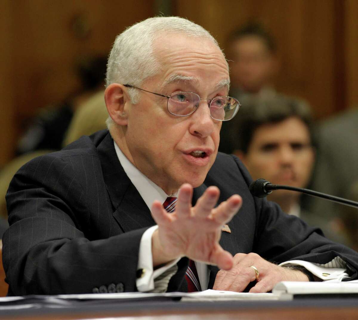 Attorney General Michael Mukasey testifies on Capitol Hill in Washington, Wednesday, July 23, 2008, before the House Judiciary Committee hearing on oversight at the Justice Department. (AP Photo/Susan Walsh)