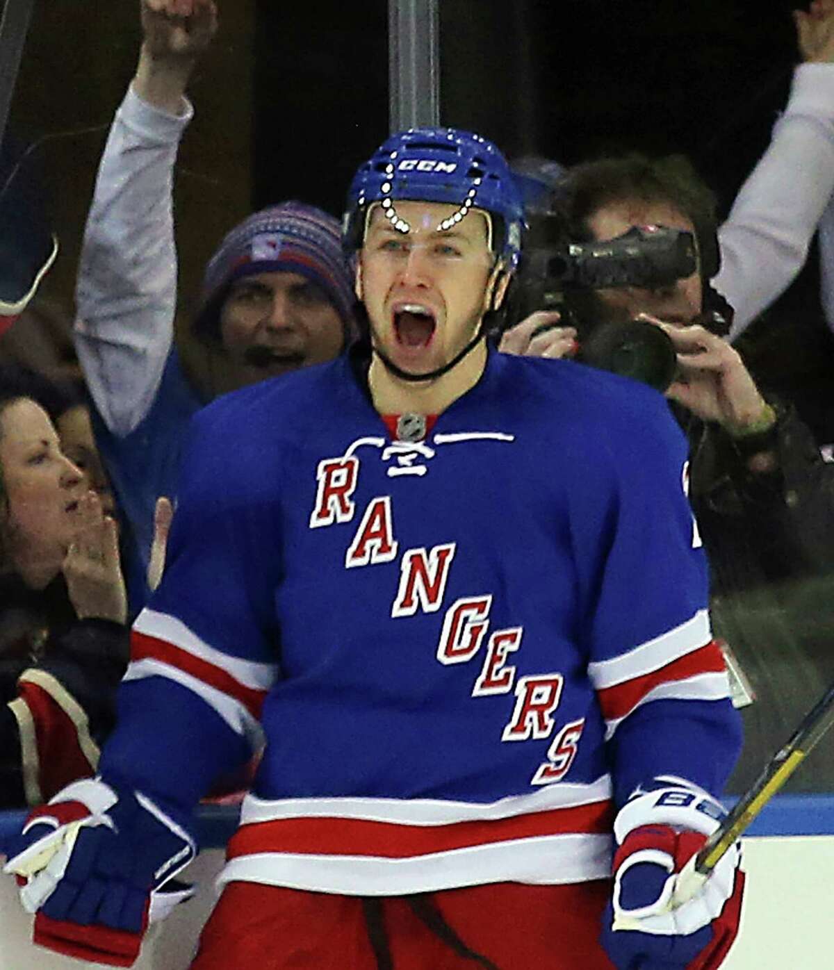 NEW YORK, NY - APRIL 01: Derek Stepan #21 of the New York Rangers celebrates his score at 19 seconds of the first period against the Winnipeg Jets at Madison Square Garden on April 1, 2013 in New York City. The Rangers defeated the Jets 4-2 as Stefan scored two. (Photo by Bruce Bennett/Getty Images)