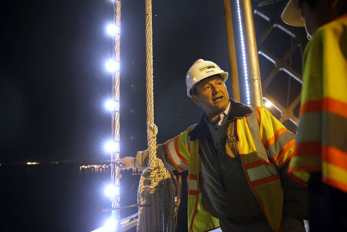 Zoon Engineering Senior Construction Manager Saeed Shahmirzai, explains the installation of The Bay Lights on the Bay Bridge in San Francisco, Calif., on Wednesday, October 7, 2015.
