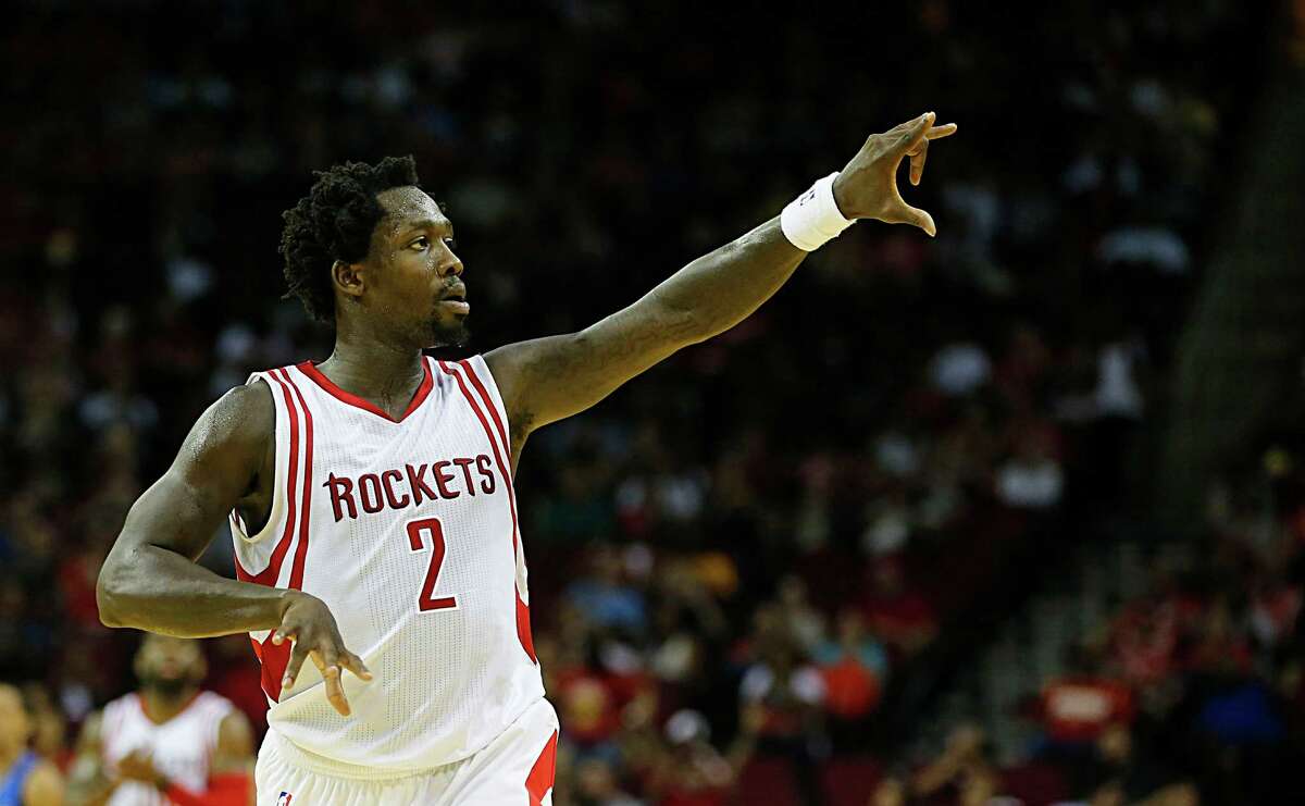 Houston Rockets guard Patrick Beverley reacts after scoring a shot against the Dallas Mavericks during second half NBA preseason game action at the Toyota Center Wednesday, Oct. 7, 2015, in Houston. ( James Nielsen / Houston Chronicle )