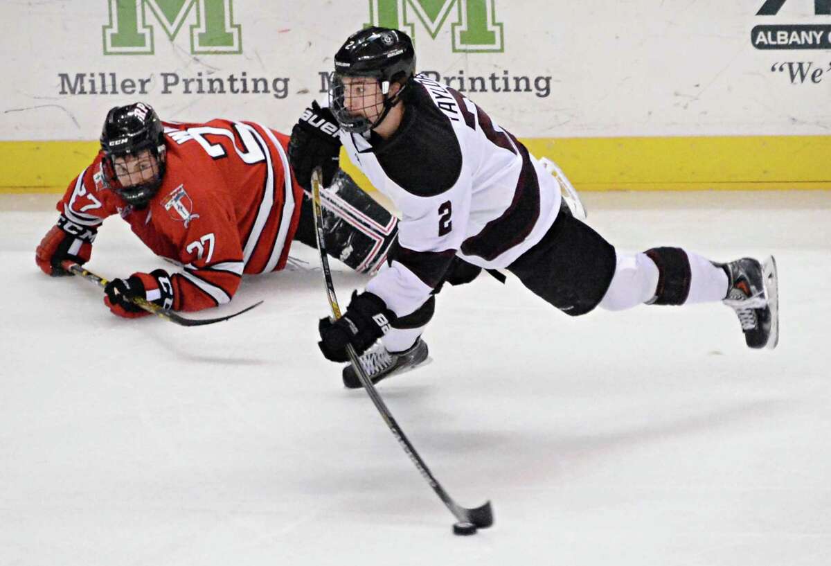Union's #2 Jeff Taylor,right, looks and RPI's #27 Jake Wood during Saturday's Mayor's Cup game at the Times Union Center Jan. 24, 2015, in Albany, NY. (John Carl D'Annibale / Times Union)