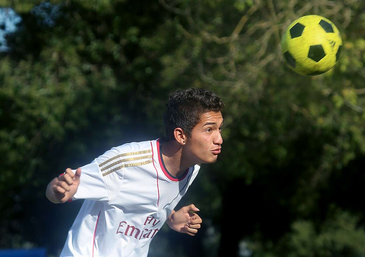 Dennis Escalante, 17 years old, captain on his soccer team with Soccer Without Borders has practice at Mosswood park after school in Oakland, Calif., on Thursday, October 8, 2015.