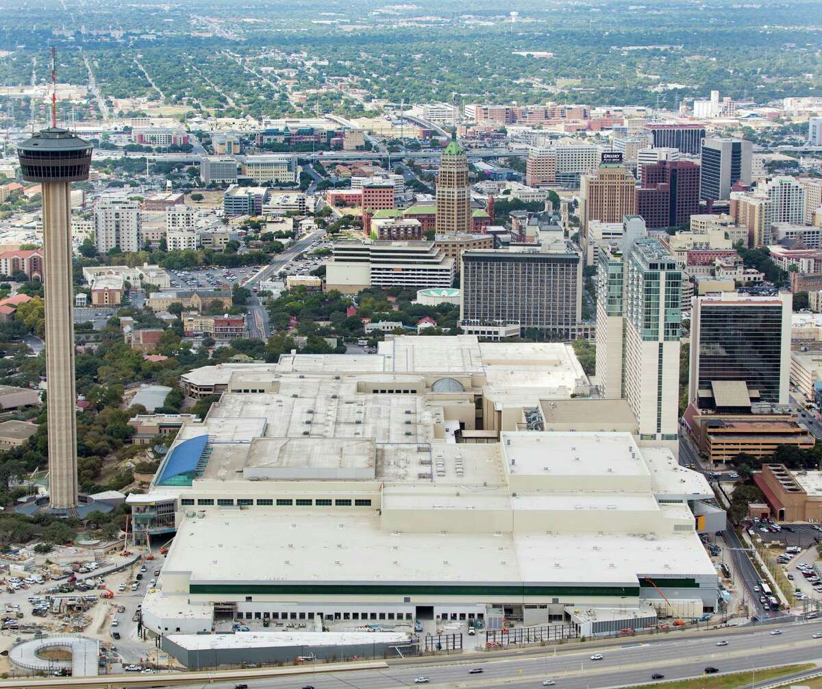 The recently-expanded Henry B. Gonzalez Convention Center, the large, flat, white-roofed building, is seen in a Thursday Oct. 8, 2015 aerial photo.