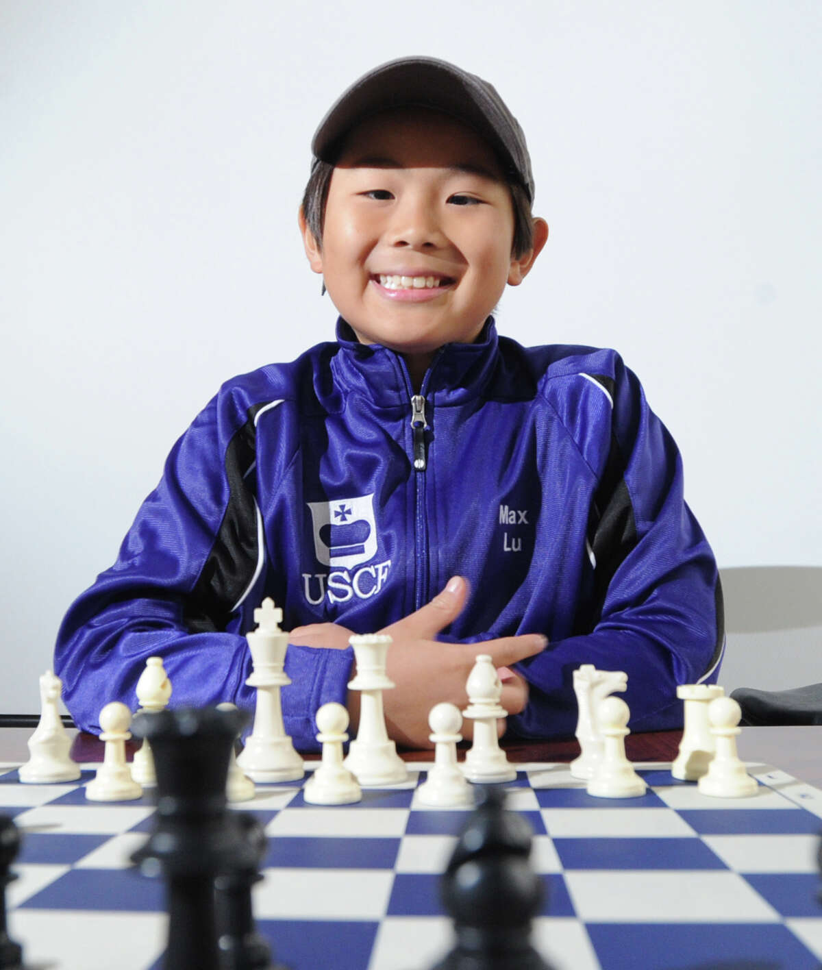 Max Lu, a 10-year old Whitby School student, seen here at the Greenwich Time, Friday, Oct. 2, 2015, has become the youngest chess player to earn the master rating in U.S. Chess Federation history.