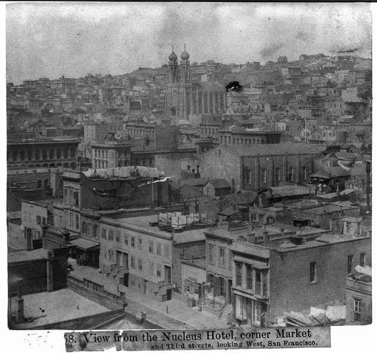 The view from the Nucleus Hotel on the corner of Market St. The five-story hotel was one of the largest brick buildings on Market. It was demolished in the late 1890s and the present-day Hearst Building took its place (which is itself a second iteration since the original was destroyed in the 1906 earthquake and fire).