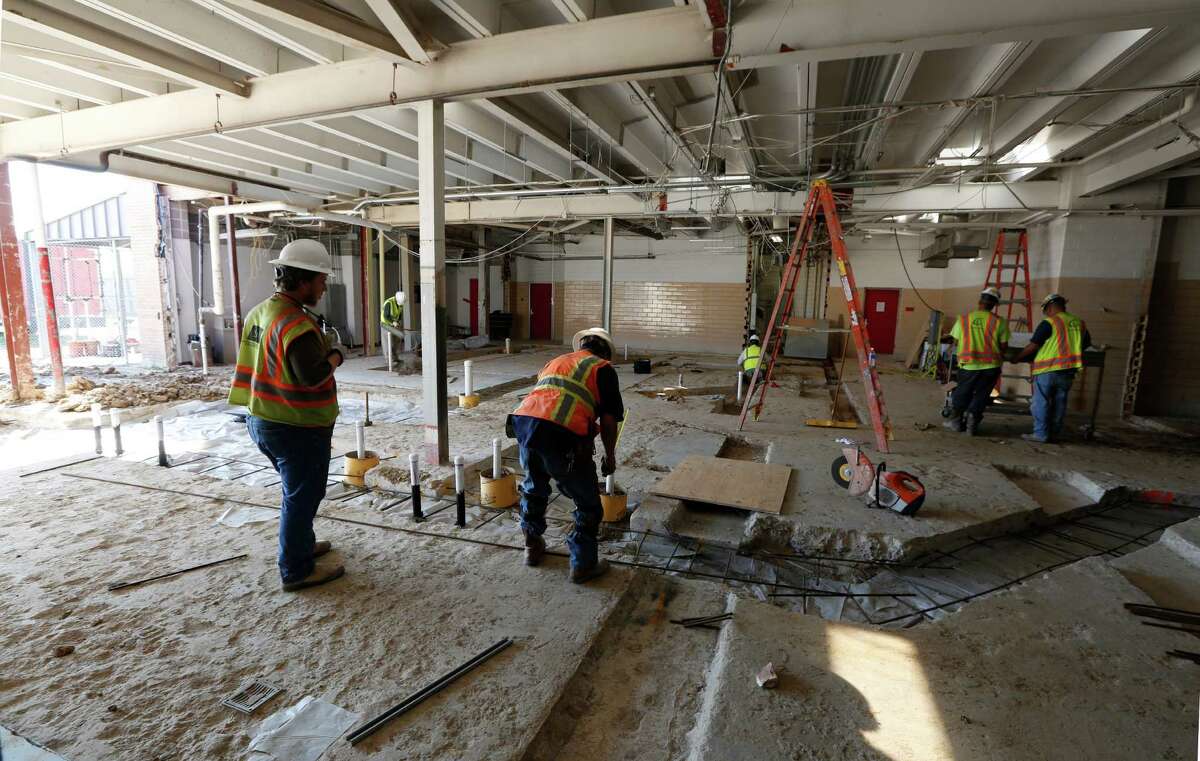 In this 2015 file photo, construction workers finish an addition to Waltrip High School, which received $30 million worth of upgrades from a 2012 bond. Voters in Houston ISD could be asked to approve a bond, possibly totaling $1.2 billion, under financial plans announced this weekend.