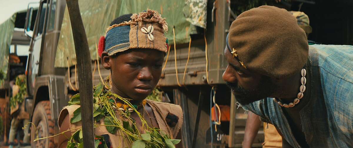 Idris Elba and Abraham Attah in the Netflix original film "Beasts of No Nation." (Netflix)