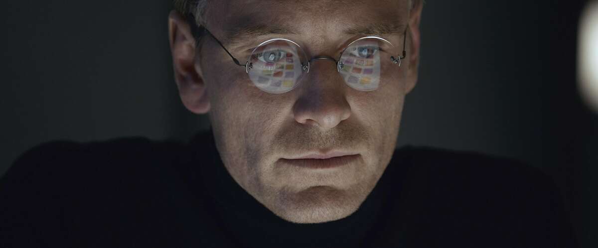 In this image released by Universal Pictures, Michael Fassbender stars as Steve Jobs in a scene from the film, "Steve Jobs." The movie opens in U.S. theaters on Friday, Oct. 9, 2015. (Universal Pictures via AP)