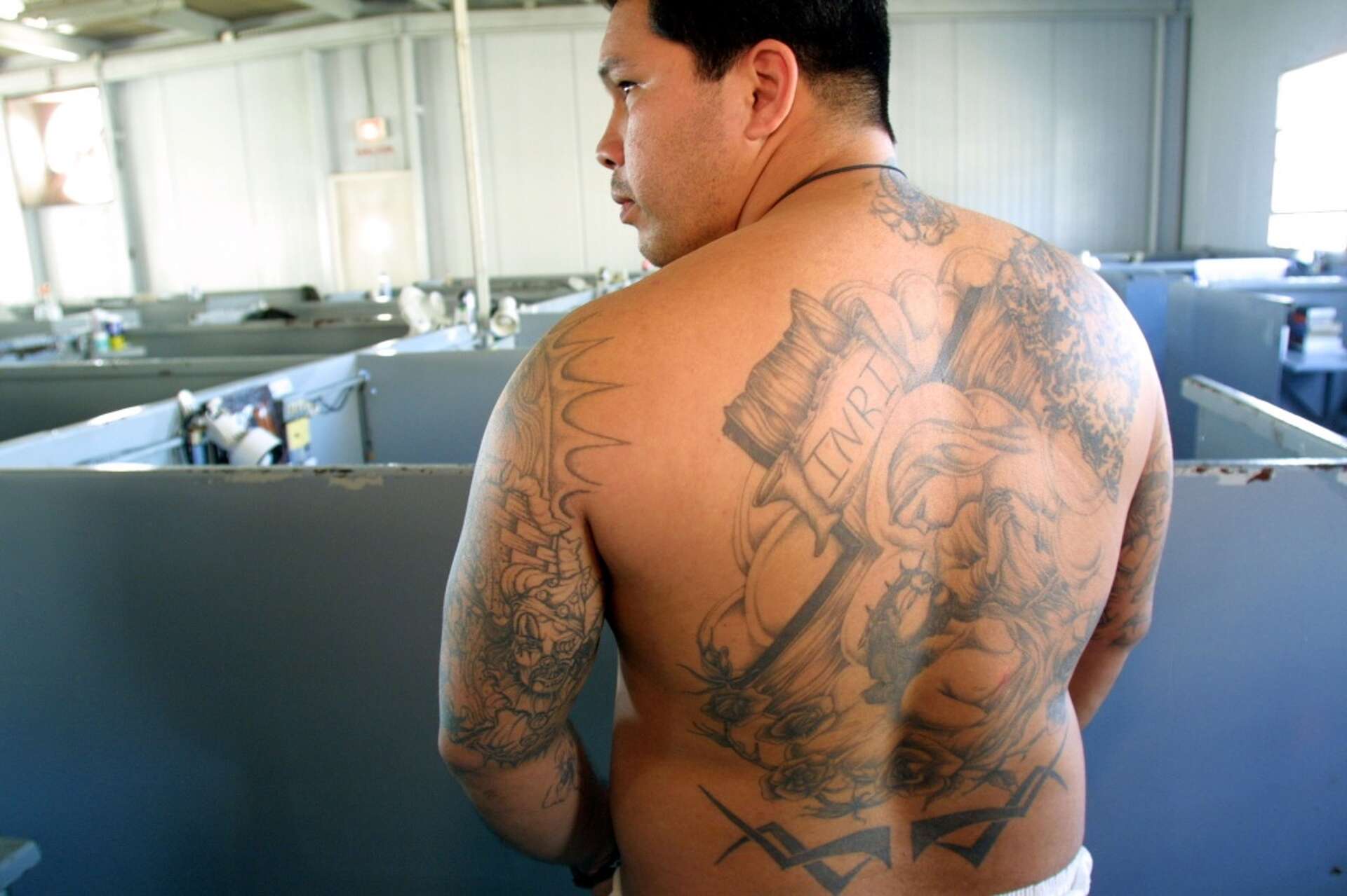 Tattoos define the gangs threatening Texas and other places around the world, image size:1920x1279