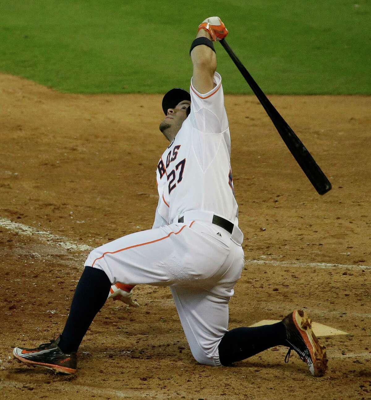 Houston Astros Jose Altuve slides to the ground as he pops out to third baseman Mike Moustakas in foul territory during the seventh inning of Game 3 of the American League Division Series at Minute Maid Park Sunday, Oct. 11, 2015, in Houston. ( Melissa Phillip / Houston Chronicle )