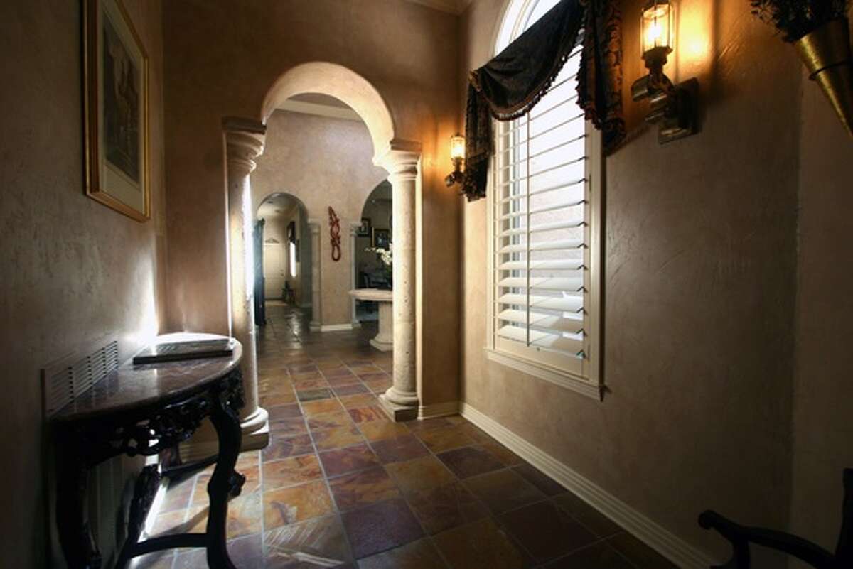 A Shavano Park home with a “liberal rendering of part of the Sistine Chapel” in its living room has hit the market for $1.3 million. The home, located at 4 De Zavala Place, includes three bedrooms, numerous arches, 20 massive columns, a Gothic-style frieze in the foyer and several murals, according to Zillow.