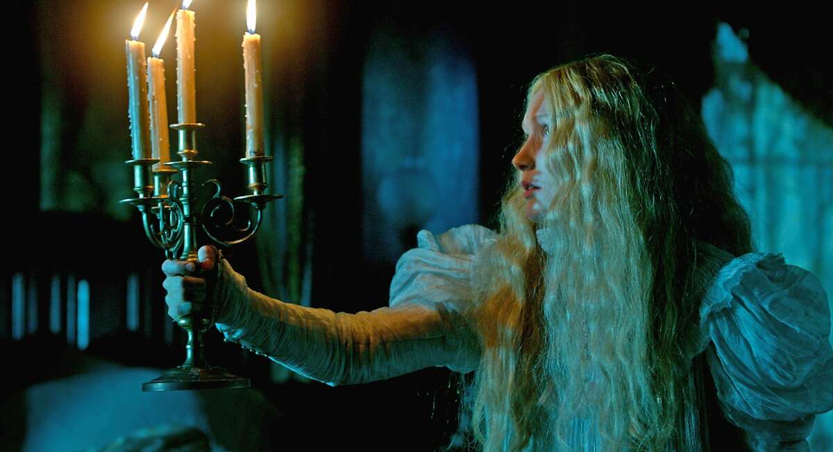 This photo provided by Legendary Pictures and Universal Pictures shows Mia Wasikowska as Edith Cushing in a scene from Legendary Pictures' "Crimson Peak," a gothic romance from director, Guillermo del Toro. (Legendary Pictures and Universal Pictures via AP)