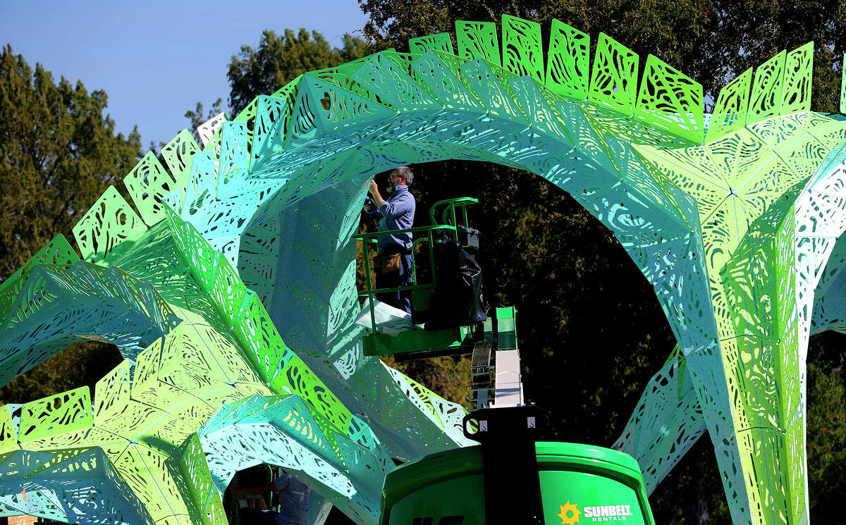 Randy Domeck of Indianapolis Fabrications assembles aluminum pieces of an art object Tuesday October 13, 2015 currently being constructed near Woodlawn Lake Park at the corner of South Josephine Tobin and Cincinatti. Designed by architect and artist Marc Fornes of the New York based studio THEVERYMANY, the canopy structure is composed of 1,000 pieces and 20,000 rivets according to Lance Pruitt of Indianapolis Fabrications. Pruitt said assembly of the mechanical structure should be completed by this Thursday.