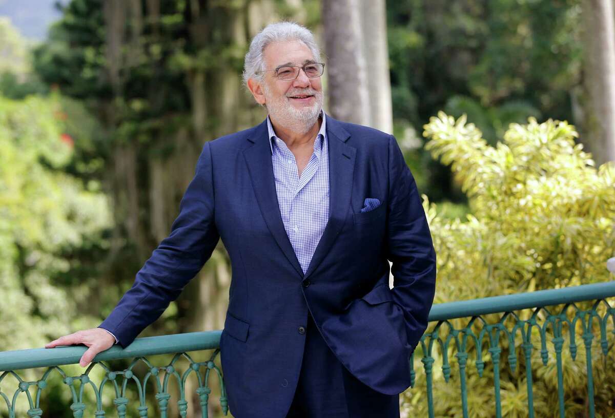FILE - In this July 3, 2014 file photo, tenor Placido Domingo poses for a photo after a press conference in Rio de Janeiro, Brazil. The Metropolitan Opera said Wednesday, Oct. 14, 2015, that Domingo was admitted to the hospital with inflammation and will undergo gallbladder removal next week.He is expected to make a full recovery in time to conduct the performance on Nov. 2, as well as performances for which he was originally scheduled on Nov. 6, 11, and 14. (AP Photo/Silvia Izquierdo, File) ORG XMIT: NYET336