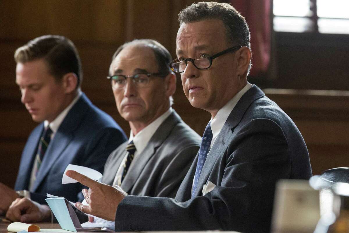 In this image released by Disney, Tom Hanks, from right, Mark Rylance and Billy Magnusson appear in a scene from "Bridge of Spies." (Jaap Buitendijk/DreamWorks Pictures/Fox 2000 PIctures via AP)