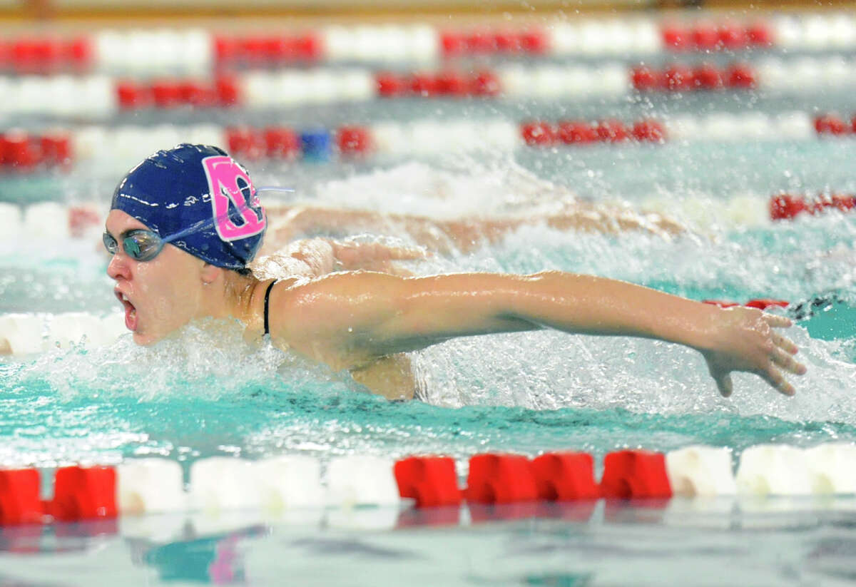 Mia Bullock of Staples swims the 200 individual medley during the high school swimming meet between Greenwich High School and Staples High School at Greenwich, Conn., Thursday, Sept. 24, 2015.