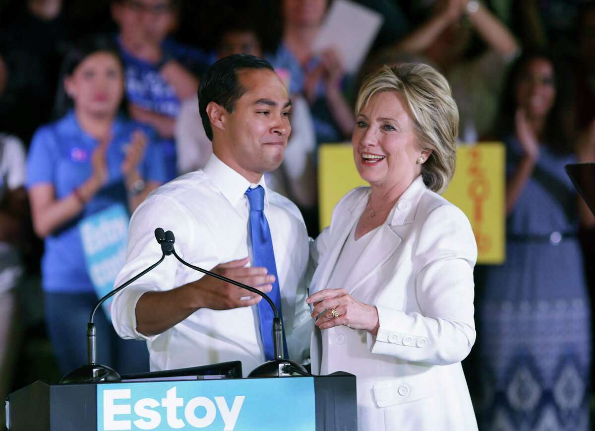 Presidential candidate Hillary Clinton, right, embraces former San Antonio mayor, U.S. Secretary of HUD Julian Castro before she spoke to supporters at a rally on Thursday, Oct. 15, 2015 at Sunset Station in San Antonio.