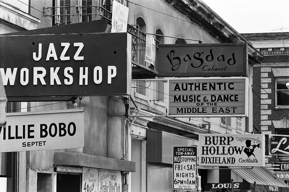 SAN FRANCISCO - 1967: Jazz clubs line the street in early summer 1967 in San Francisco, California. Note that the Willie Bobo Septet is playing at the Jazz Workshop.