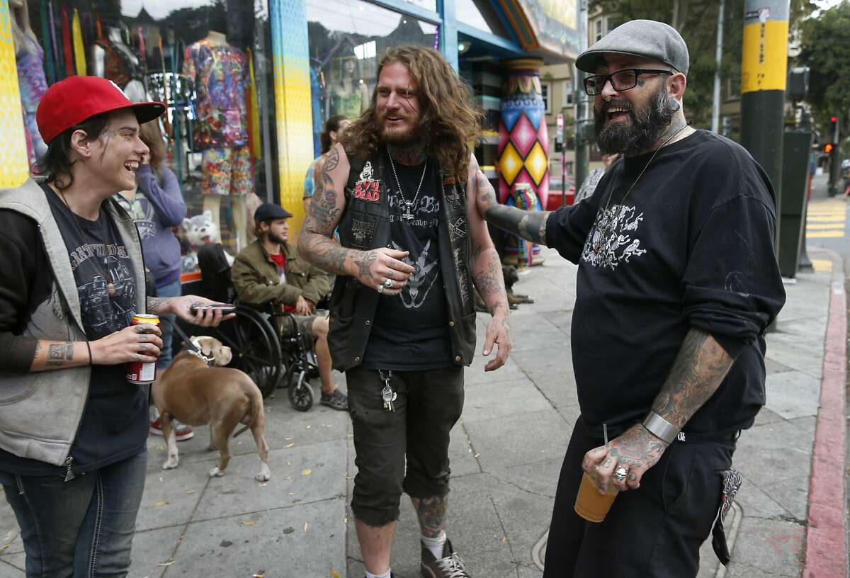 Christian Calinsky (right) meets with Maggie May (left) and Davis Wood (center) in San Francisco, Calif. on Thursday, Oct. 15, 2015. Calinsky runs the Taking It to the Streets program, which provides teens and young adults living on the streets an opportunity to clean up the Haight Ashbury neighborhood in exchange for housing and social services.