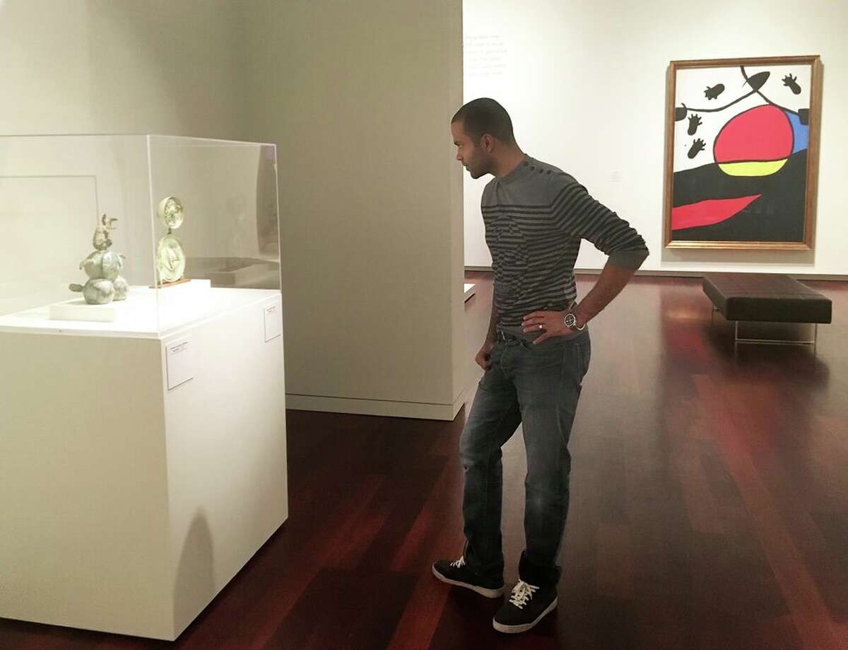 Spur Tony Parker looks at two small-scale sculptures by Joan Miró at the McNay Art Museum.