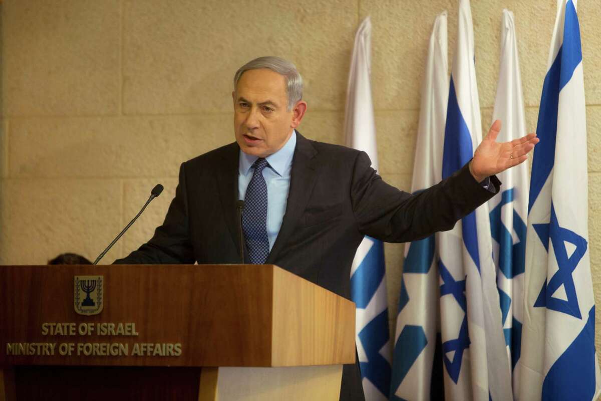Israeli Prime Minister Benjamin Netanyahu gestures as he speaks during a press conference at the Foreign Ministry in Jerusalem, Thursday, Oct. 15, 2015. Netanyahu on Thursday said he would be "perfectly open" to meeting with Palestinian President Mahmoud Abbas in order to end weeks of Israeli-Palestinian unrest. (AP Photo/Sebastian Scheiner)