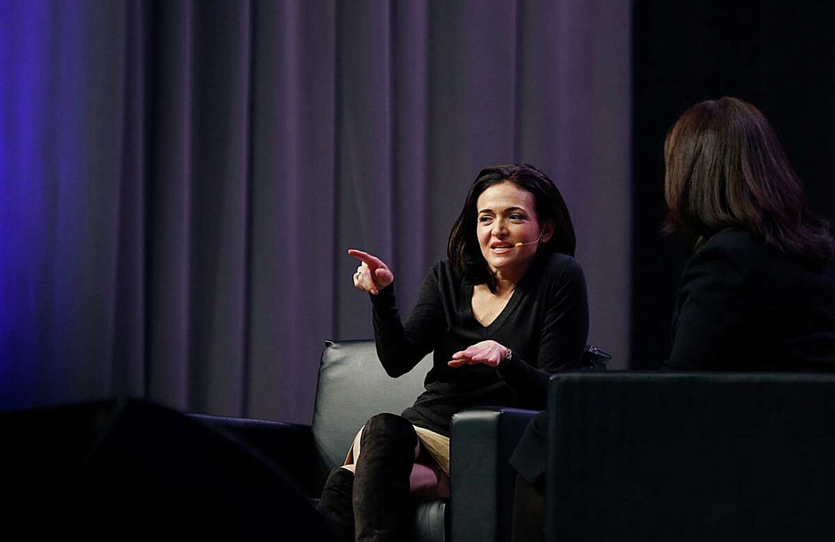 Facebook executive and author Sheryl Sandberg asked a crowd consisting mostly of women to do "small acts of assertiveness."