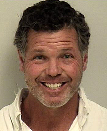 Cops: Man charged with assault after fight with neighbor
