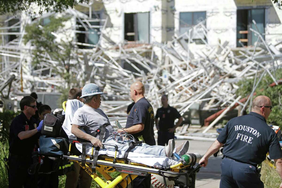 Scene at scaffolding collapse at a building under construction on Crawford near Congress across the street from Minute Maid Park shown Friday, Oct. 16, 2015, in Houston.