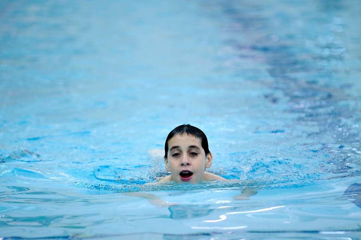Jesus Salcedo, 11, of Greenwich, swims the breast stroke in the pool at the Greenwich Boys & Girls Club, Tuesday, March 23rd, 2010. Salcedo is involved in a social services and Greenwich Boys & Girls Club program aimed at giving kids in low income families an opportunity to learn sailing but first they have to learn swimming and are doing just that in the pool at the Greenwich Boys & Girls Club.