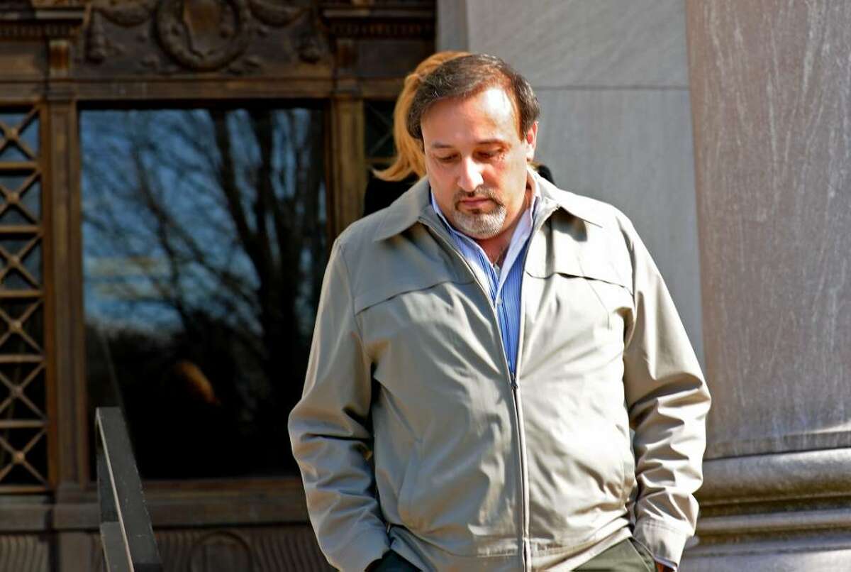 Shelton developer James Botti leaves the US District Court in New Haven on Friday, Mar. 26, 2010 following the second day of deliberation in his trial for alleged corruption.
