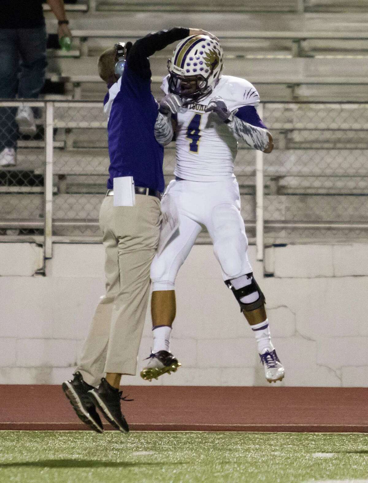 Montgomery coach John Bolfing and wide receiver Jake Loera were walking on air after Loera's long touchdown catch in Friday's District 15-6A game against Spring at George Stadium.