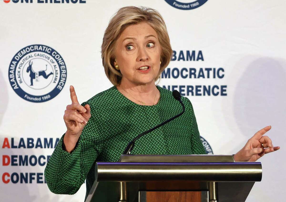 Democratic presidential candidate Hillary Clinton recently vowed to take on the NRA over gun control. In response, NRA lobbyist Chris Cox said Clinton is out of touch with the American people. speaks during a meeting of the Alabama Democratic Conference in Hoover, Ala., Saturday, Oct. 17, 2015. Clinton tells black Alabama Democrats that she'd champion voting rights in the White House. She says Republicans are dismantling the progress of the civil rights movement. (AP Photo/Mark Almond)