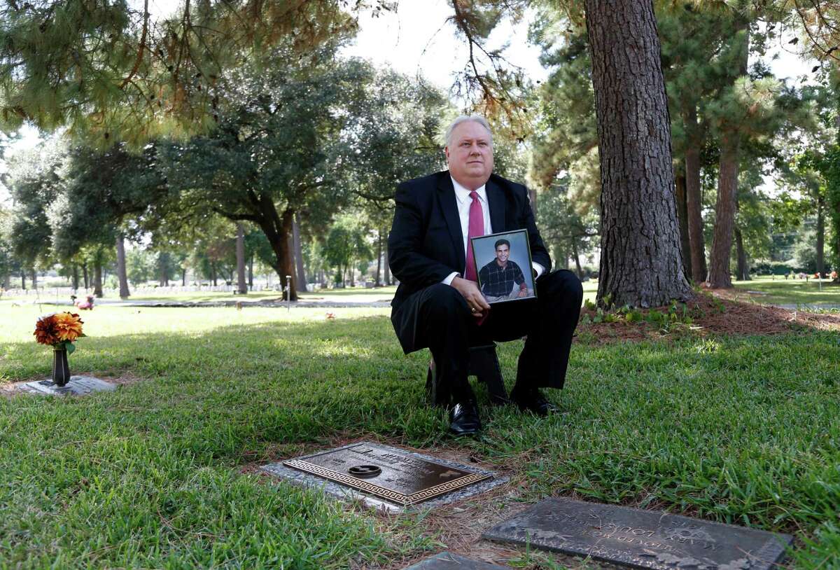 James McSwain, principal of Lamar High School, whose adult son, Phillip died in 2009 from a combination of alcohol and prescription medication, photographed at his grave on Wednesday, Sept. 30, 2015. ( Karen Warren / Houston Chronicle )