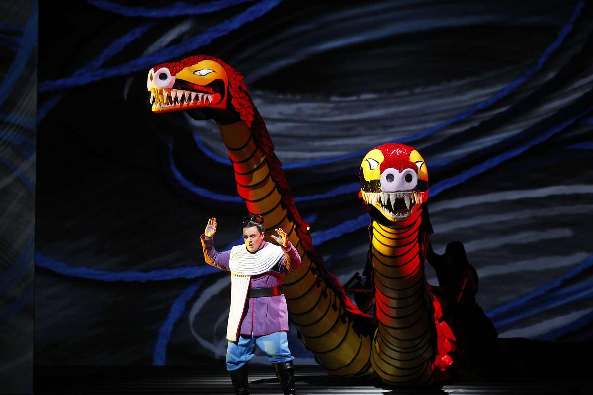 Paul Appleby as Tamino, confronting the dragon during the dress rehearsal of Wolfgang Amadeus Mozart's The Magic Flute at the War Memorial Opera House on October 17, 2015.