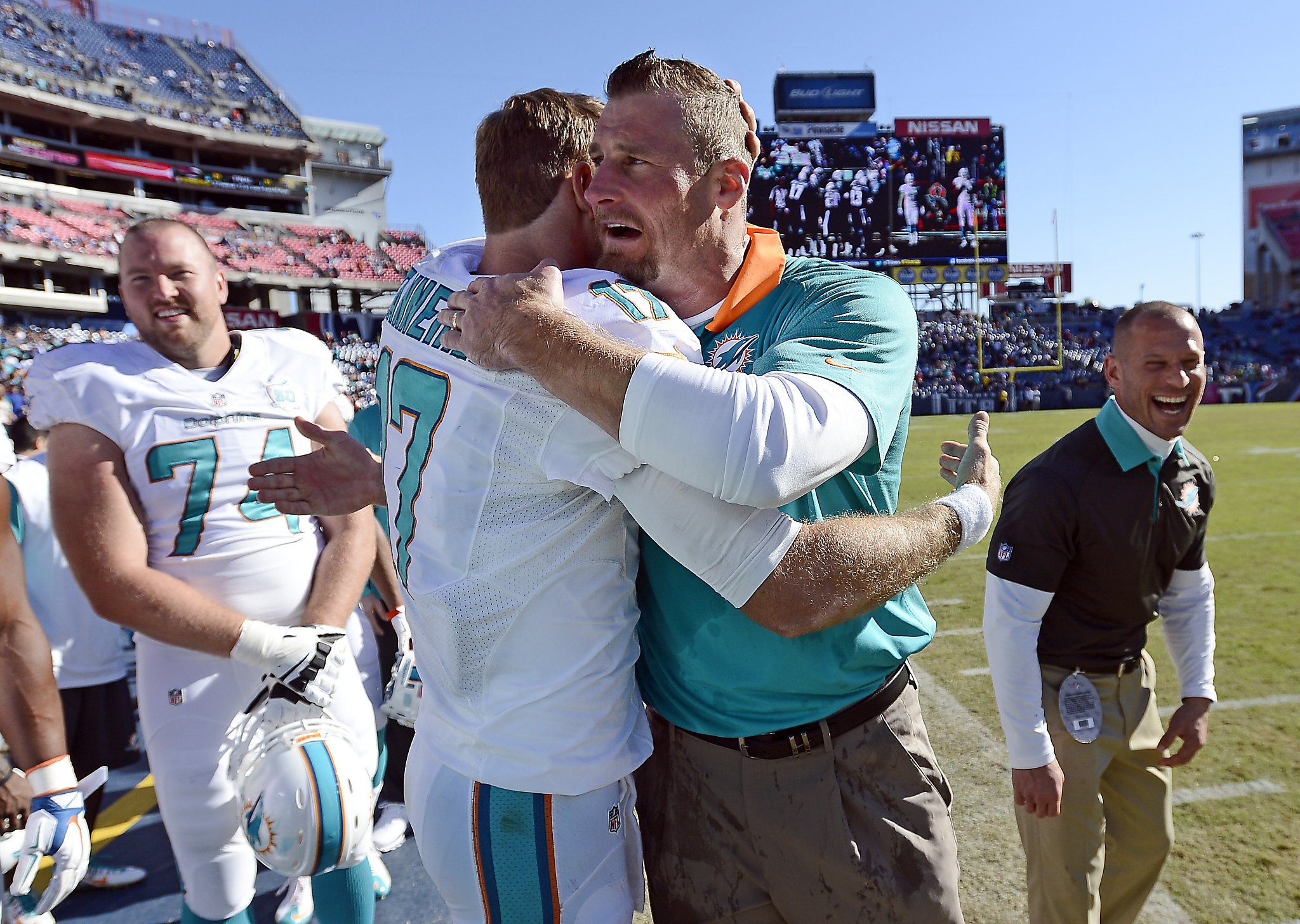 Dolphins interim coach pumped up for debut vs. Titans