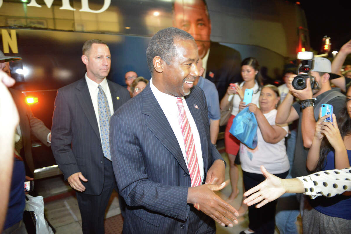 Republican presidential candidate Ben Carson signs copies of his book, "A More Perfect Union," during a recent visit to Books-A-Million in San Antonio Sunday. A reader criticizes the media for highlighting inconsistencies in his personal history.