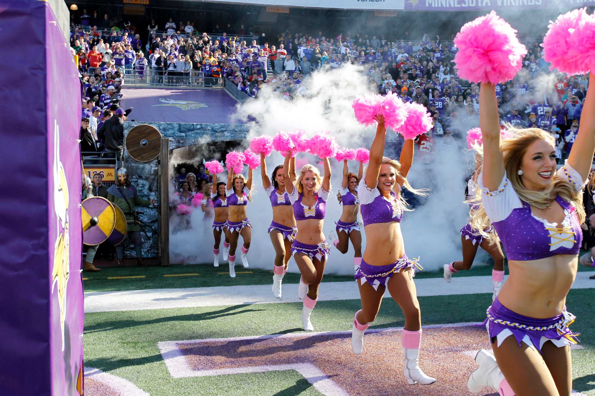 Miami Dolphins Cheerleader performs with her pom poms on the field News  Photo - Getty Images