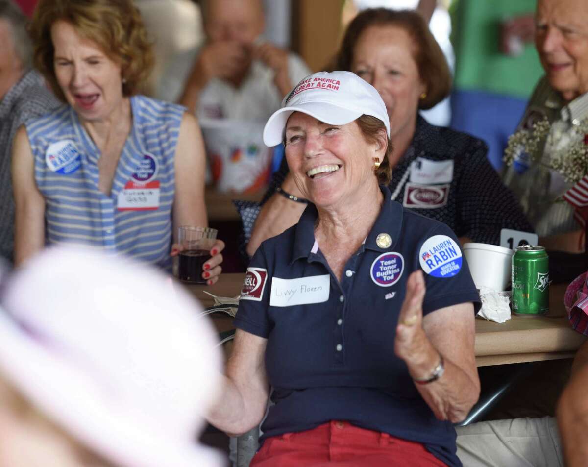 State Rep. Livvy Floren claps during the Greenwich Republican Town Committee annual clambake at Greenwich Point Park in Old Greenwich, Sept. 13, 2015. The Glenville Volunteer Fire Company will present the inaugural David N. Theis Award for Outstanding Service to the Community to state to Floren on Thursday.