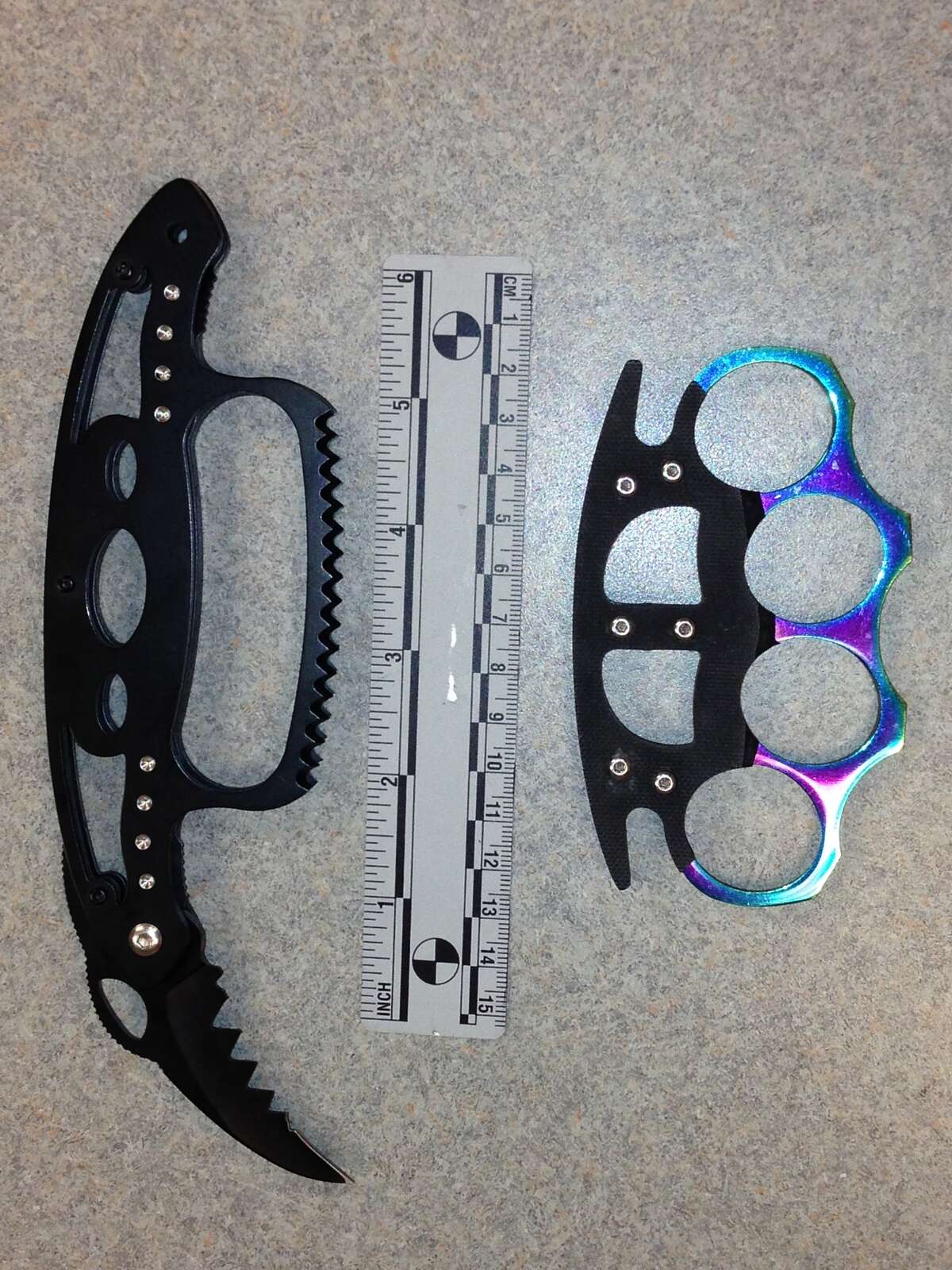 Troy man charged with possessing brass knuckles