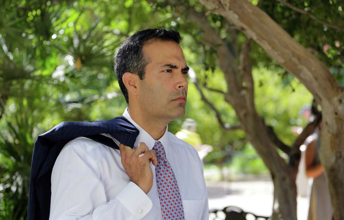 Texas Land Commissioner George P. Bush tours the grounds of the Alamo following a news conference to celebrate the $31.5 million the General Land Office received for the preservation and development of the Alamo, Wednesday, Sept. 2, 2015, in San Antonio. (AP Photo/Eric Gay)