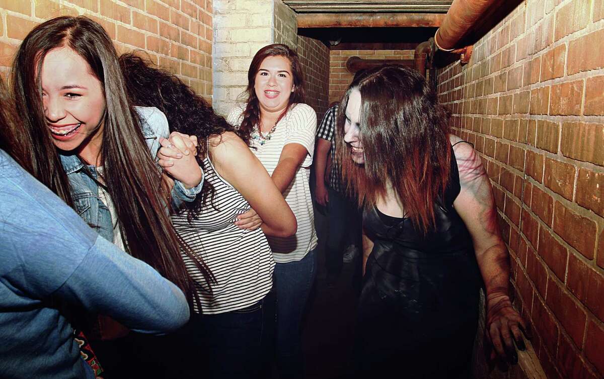 Faces of fear from San Antonio’s 13th Floor Haunted House 2015