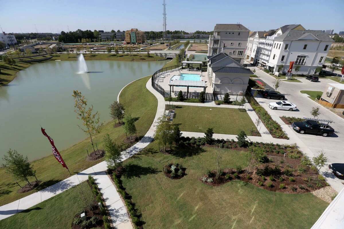Houston-based Hines is developing Somerset Green, a European style luxury neighborhood built around a canal, Monday, Oct. 19, 2015, in Houston, Texas. The development will have 560 homes from 2,600 to 4,000 square feet, multiple walking trails, two dog parks and an amenity center with swimming pool. Toll Brothers, Coventry Homes and Pelican Builders are the builders. ( Gary Coronado / Houston Chronicle )